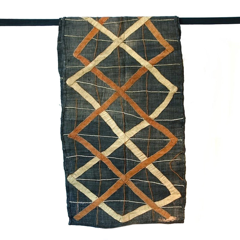 Denim colored cloth with brown and cream criss cross pattern