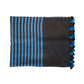Blue and black stripped scarf with black and blue pompoms, folded